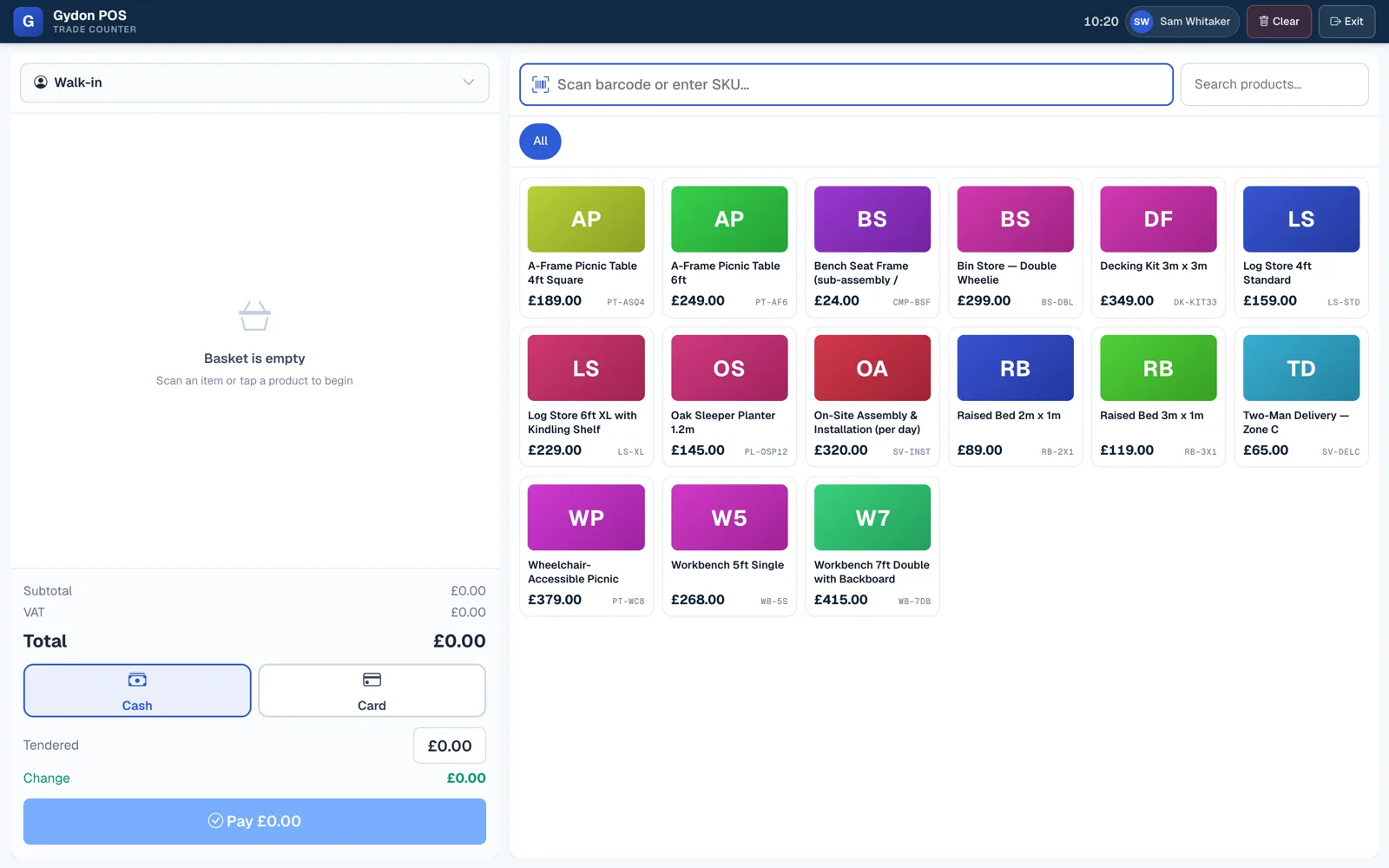 The Gydon trade counter point of sale on a wide screen. A barcode or SKU box sits across the top with a product search beside it, then a grid of product tiles each showing a name, a price and a SKU. The left hand side shows the customer set to walk-in, an empty basket, subtotal, VAT and total, cash and card buttons, a tendered box and change, and a pay button.